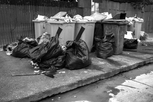 Commercial waste removal van outside a Cranford storefront