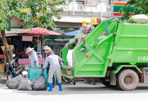 Supervisors reviewing waste handling procedures